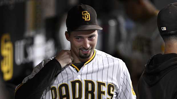 Sep 19, 2023; San Diego, California, USA; San Diego Padres starting pitcher Blake Snell (4) looks on from the dugout during the eighth inning against the Colorado Rockies at Petco Park. Mandatory Credit: Orlando Ramirez-USA TODAY Sports  